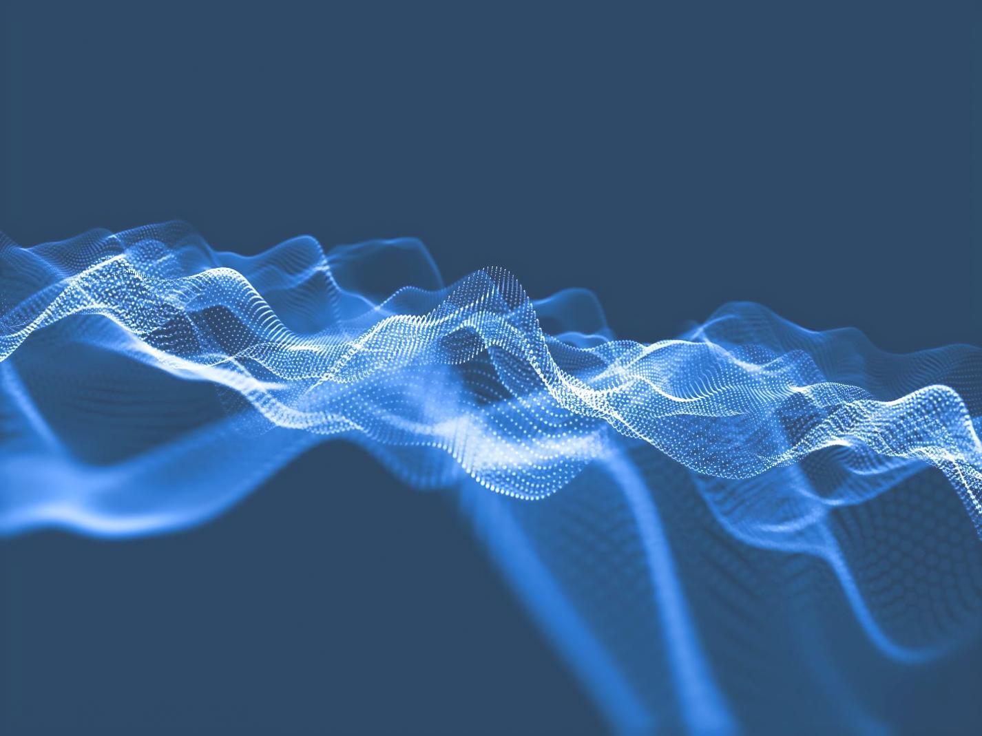 Multiple developers collaborating on blockchain project in modern office environment