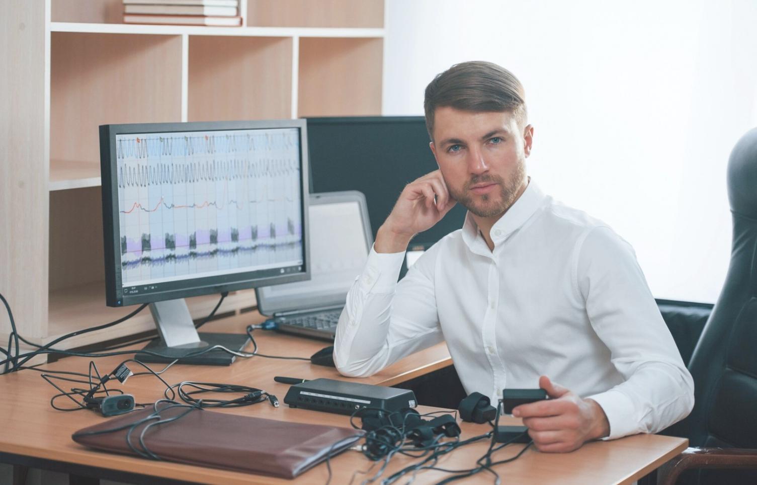 Students collaborating on blockchain development projects in modern learning environment